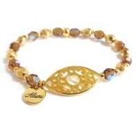 Pulsera elástica cristal de roca topaz y dorado de 6 mm y ojo filigrana baño oro.